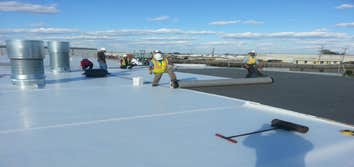 Photos by A Grade Roofing