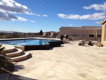 Reverse negative edge Travertine deck, spa, reverse negative edge play pool,
