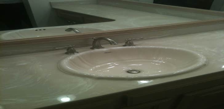 bathroom upgrade We cut out the old stained lavatory and dropped in a new porcelain sink and faucet, built and installed pickeled oak frames for the mi