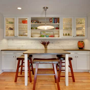 Wedgwood Kitchen Blue Sound Construction, Inc. updated this Wedgwood kitchen with some re-framing, all new cabinets, flooring, Calcutta Gold (marble) t