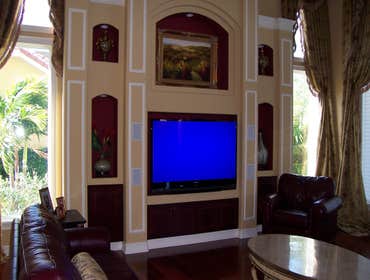 Various photos of a couple of the many professional installations Connected Technology has done. From full-blown home theaters to music, lighting contr