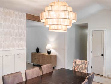 Photos by Albrecht, LLC #1 Through strategic space planning, thoughtful material selections, and custom craftsmanship, this first-floor renovation tran