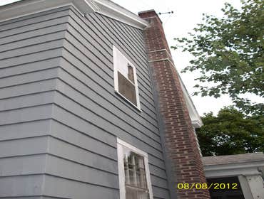 Brilliant Painting, LLC Exterior Project 1 Before and after photos of a full house that has been power washed, scraped, hand sanded, primed, and painte