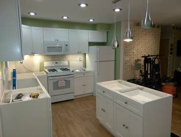 Kitchen Remove full kitchen, Remove wall, install new housing lights new electrical outlet gfi new under caninet lighting, new plumbing new gas lines ,