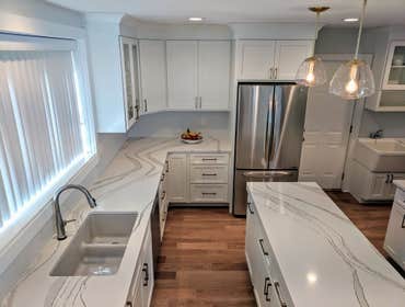 Quartz Countertops, New Hardwood Flooring