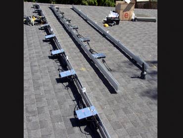 Installations Green Stock Solar ground-mounts and installations on comp, tile, and metal roofs!