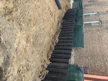 Photos by Excavo Construction Co #1 Sheet pile shoring and bracing