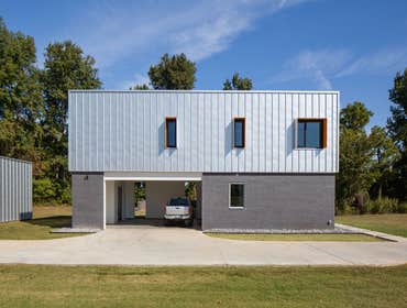 House For 5 A family with three children recently moved to a small, rural, west Tennessee town where they sought a house more suited for their contempo