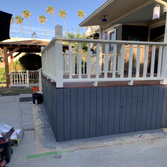 Photos by Idm Framing #3 costumer added 6 ft extension to the back porch, additionally she added a 11'x11' pergola with pyramid roof, deck was stained