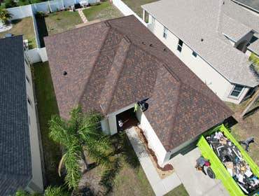 Photos by WOODSTONE ROOFING