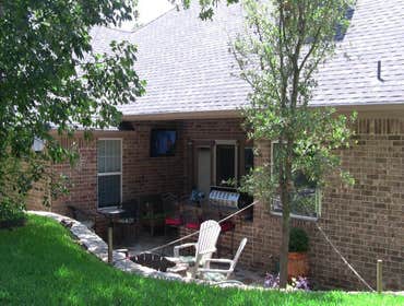 Cedar Garage Door and Backyard Kitchen