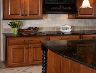 Kitchen Cabinet Refacing View our project portfolio to see our high-quality kitchen cabinet refacing restorations.