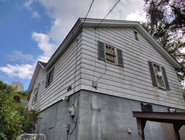 Photos by Ground Up Home Improvements #2 We wrapped everything with an alumium soffit and facia with A-1 seamless gutters, Tucking metal on old wood ke
