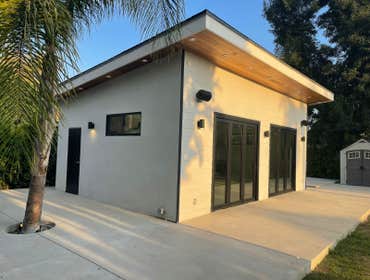 New ADU This new ADU in Los Gatos was built from the ground up, featuring a modern open layout with high ceilings, exposed beams, and large windows tha
