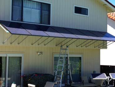 Installations Green Stock Solar ground-mounts and installations on comp, tile, and metal roofs!