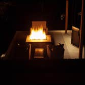 Photos by PacifiCoastal Design and Construction #2 Backyard remodel with fire feature, composite deck, custom concrete work, retaining walls, golf putt