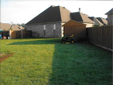 Before view of yard where Kitchen and pool house will go