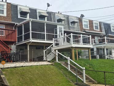 Photos by Bowman Construction LLC #3 Two tier vinyl/pvc deck & porch enclosure