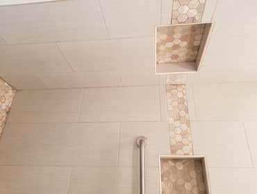 V. Jones Bathroom/Laundry Room Remodel - Tub to Step-in Shower Conversion with Linear Drain
- New Vanity, Toilet, Sink, mirror, toiletries
- All new fl