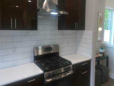New construction - custom kitchen cabinet, quartz countertop, subway tile, appliances New construction - custom kitchen cabinet, quartz countertop, sub