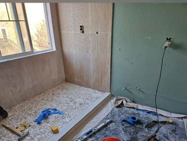 Photos by Idrogo Construction Services LLC #3 Complete master bathroom remodel with dual showers, custom porcelain tile installation, waterproofing, mo