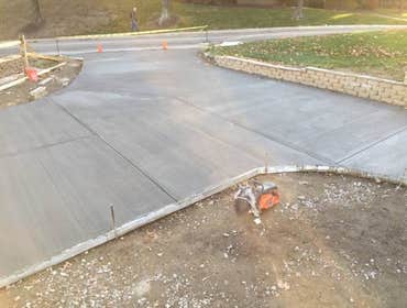 Photo(s) from Hollis Contracting After digging back the yard, we built a cement block wall which is completely filled with concrete to reinforce the wa