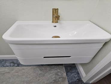Fine Design Remodeling resume painting, frame, tile, cabinet install, shower, more.