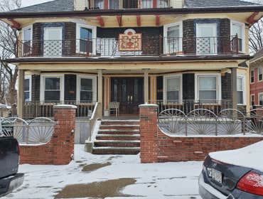Photos by Triple Infinity LLC #2 The deck was redone from it's original 1889 frame. The home owner's built a concrete sloped deck on the bottom with wo
