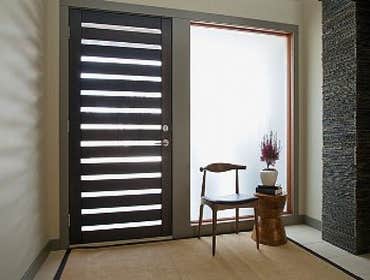 Custom Sliding Door Replaced a residential custom sliding door, energy efficient and bronzed.