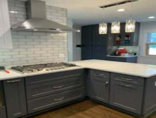 Photos by Es Carpentry Inc #1 Basement and first Floor complete gut and Remodel