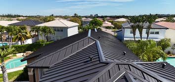 Photos by Gold Star Miami Corp #1 metal roof panels all are . 25 years warrantee