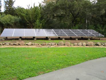 Installations Green Stock Solar ground-mounts and installations on comp, tile, and metal roofs!