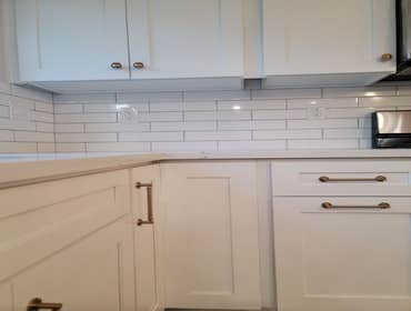 Fine Design Remodeling resume painting, frame, tile, cabinet install, shower, more.