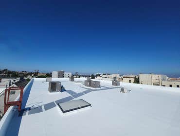 50 mil white, pvc IB Roof System installation