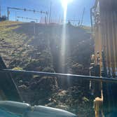 Photos by Spread the Light Homes LLC #4 Trench for underground electrical to commercial buildings.
