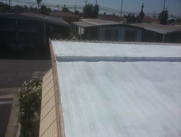 Elastomeric white roof coating