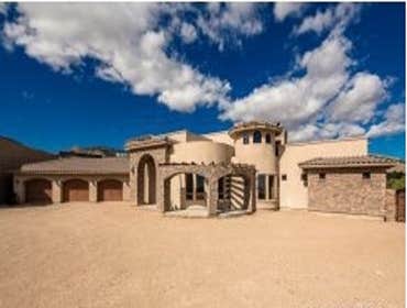 Photos by Sequoia Homes LLC #1 This Tuscan/Mediterranean style home is truly one of Mohave County's finest luxury homes. Over 1 acre of property in the