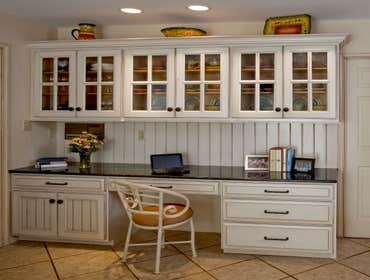 Kitchen Cabinet Refacing View our project portfolio to see our high-quality kitchen cabinet refacing restorations.