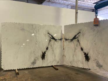 Photos by Luxury Interiors and More #1 granite, marble,quartz slabs for kitchen countertops and bathrooms
