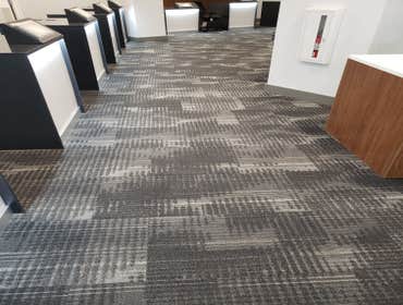 Ala Moana - Spectrum Install Carpet Tiles front of House and VCT and Sheet Vinyl Back of House.