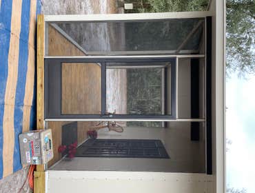 Photos by Big Water Custom Homes & Realty Inc Insulated Panel Cabin with Screen Porch