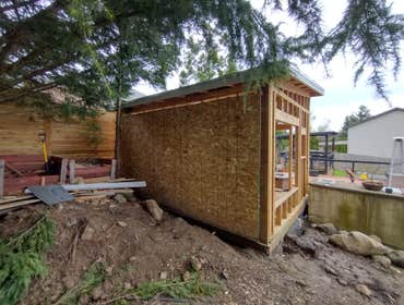 Photos by Stewart & Son Gate & Fence LLC #1 Tiny House with pergola. Small house 17' by 12' small bathroom with pocket door, and small sink with water 