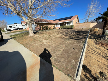 Before Picture of the Painted Home with Landscape