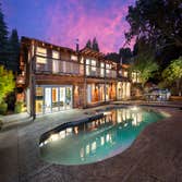 LOS ALTOS HILLS This highly sustainable, eco-friendly smart home is a high-tech architectural masterpiece. With meticulous attention to detail througho