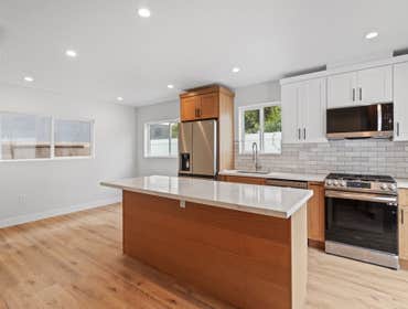 890 Sqft ADU from garage conversion convert existing 400 sqft 2 car garage and addition of 490 sqft - new 2 bed 2 bath ADU. modern look with a separate