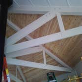 wood ceiling in octagon house This project consisted of demolition of burlap ceiling panels, replacement of damaged wood, insulation, rigid insulation
