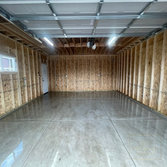 Detached Garage Rebuild with Drainage Improvements This project replaced a flood-prone garage setup with a new detached garage, upgraded foundation, ne