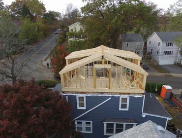 Arlington Remove existing roof frame two dormers and extend chimney increased 400 sqft of living space plus half bath.