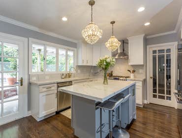 Ellenvale Ave. Woodland Hills Transitional kitchen.
Grey & white Cabinetry with Carrara Marble tops