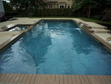 Photos from Crystal Blue Aquatics Llc New Construction of pool with full automation, LED lighting, high end travertine patio decking, beautiful water f